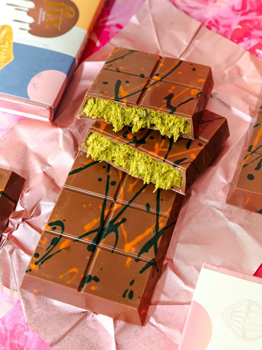 A Fix bar broken open on pink tissue